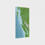 • British Columbia map print on angled wall view, emphasizing rugged West Coast geography and scale.​

